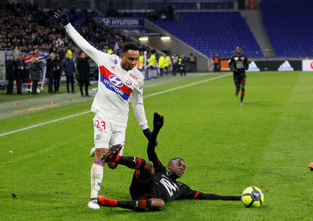 Soccer Football - Ligue 1 - Olympique Lyonnais vs Rennes - Groupama Stadium, Lyon, France - February 11, 2018 Stade Rennes’ James Lea Siliki in action with Lyon's Kenny Tete REUTERS/Emmanuel Foudrot