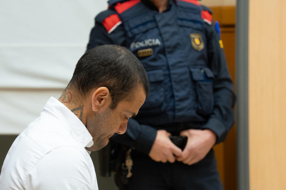 BARCELONA CATALONIA, SPAIN - FEBRUARY 05: Former soccer player Dani Alves during a trial at the Barcelona Court on February 5, 2024, in Barcelona, Catalonia, Spain. Alves is accused of sexual assault on a girl in a bathroom of the Sutton nightclub in the Catalan capital on the night of December 30-31, 2022. Denounced by the 23-year-old girl, he sits in the dock of the Audiencia de Barcelona and faces a nine-year prison request from the Prosecutor's Office, which the victim's defense raises to 12 years. After a year and 15 days in custody in Brians, the Brazilian arrives after having changed his version of events up to five times. (Photo By EUROPA PRESS/D.Zorrakino. POOL via Getty Images)