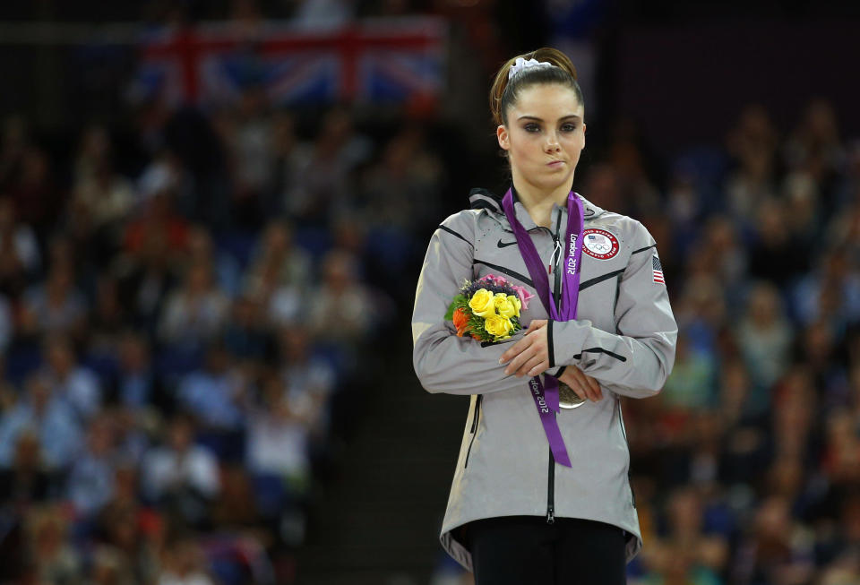 McKayla Maroney of the U.S. celebrates with her silver medal in the women's vault victory ceremony in the North Greenwich Arena during the London 2012 Olympic Games August 5, 2012. REUTERS/Brian Snyder (BRITAIN - Tags: OLYMPICS SPORT GYMNASTICS TPX IMAGES OF THE DAY) 