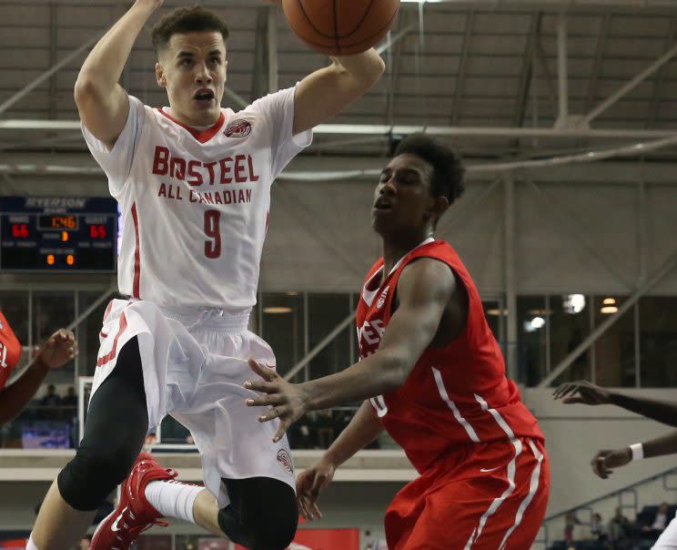 Abu Kigab (right) pokes the ball away from Corey Johnson at the BioSteel All Canadian basketball game. (Rick Madonik/Toronto Star via Getty Images)