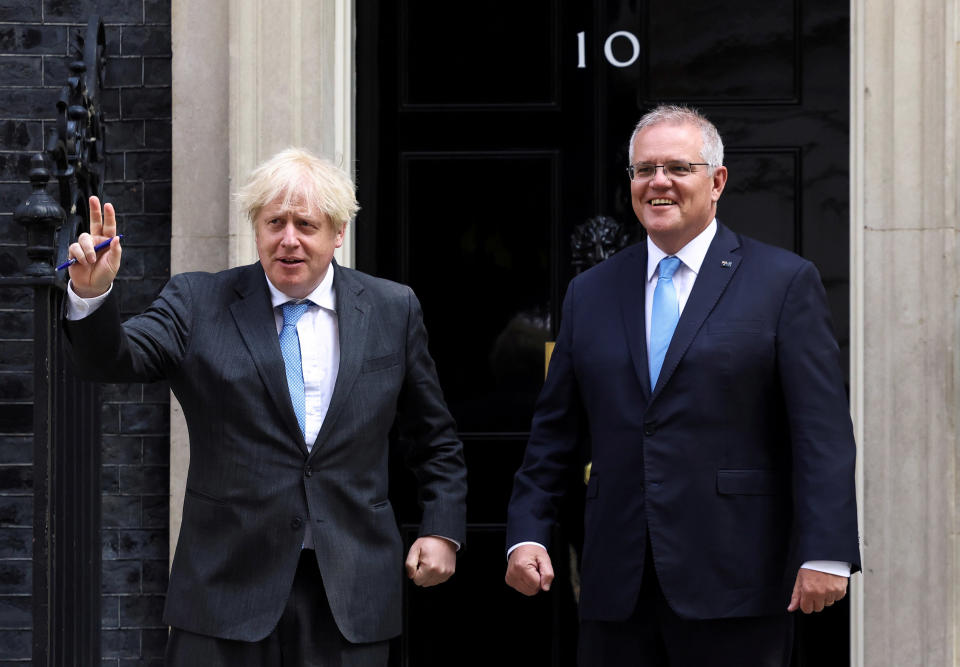 Image: British Prime Minister Boris Johnson gestures as he meets with his Australian counterpart Scott Morrison at Downing Street in London, Britain (Henry Nicholls / Reuters)