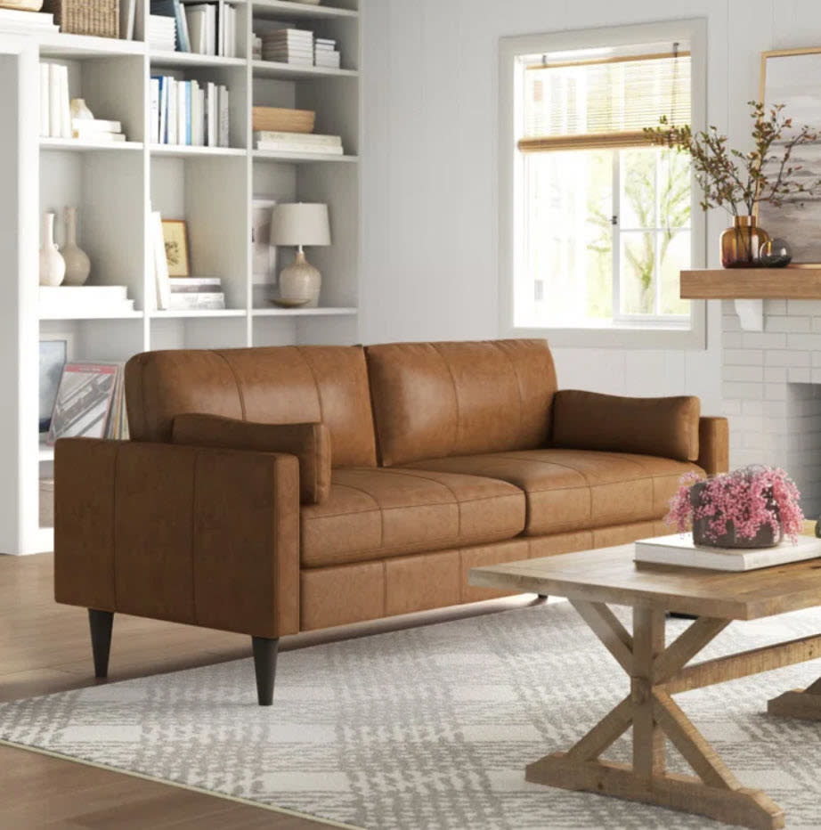 brown leather sofa in living room space