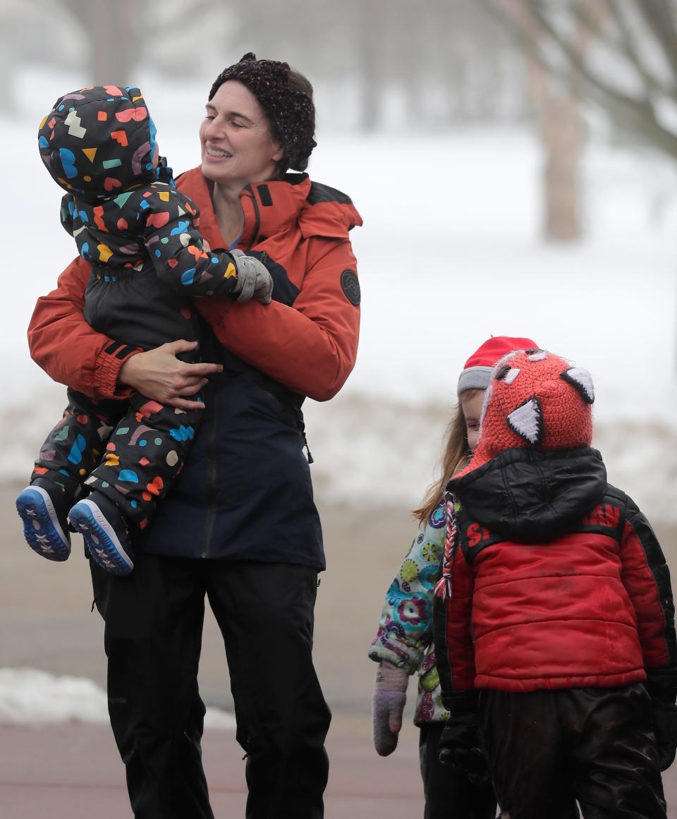 Corrine Hendrickson holds Ayven Funseth,18 months, while the children under her care play outside on Thursday, January 25, 2024 in New Glarus, Wis. Hendrickson’s program is a home based family childcare center called Corrine’s Little Explorers.
Wm. Glasheen USA TODAY NETWORK-Wisconsin