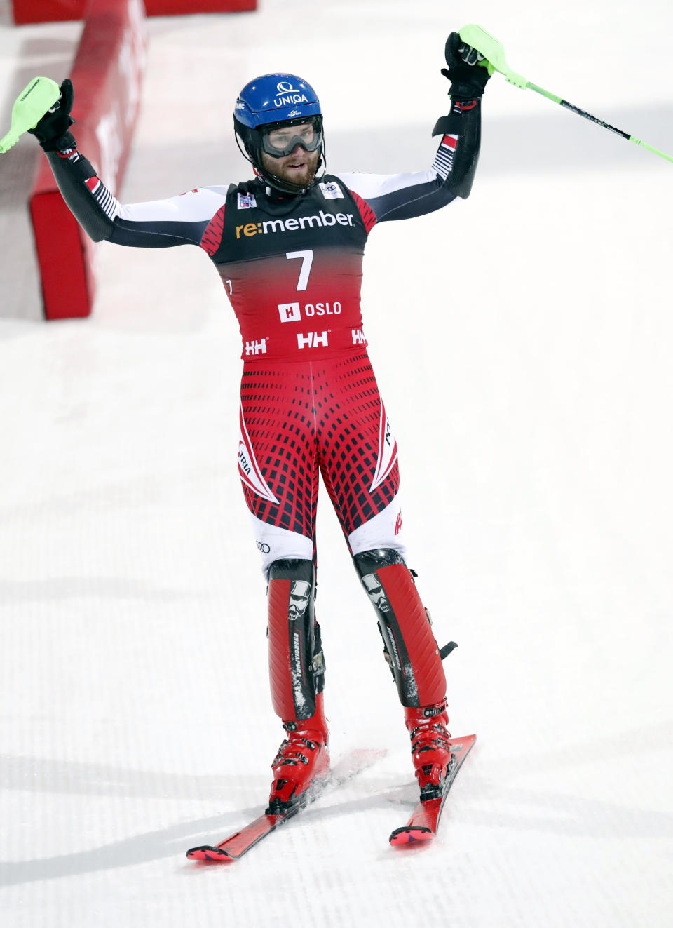 Marco Schwarz of Austria, celebrates in the finish area after winning an alpine ski, men's World Cup parallel slalom, at Holmenkollen in Oslo, Norway, Tuesday, Jan. 1, 2019. (Terje Bendiksby/NTB scanpix via AP)