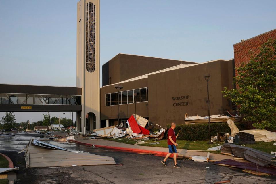 A man views damage at First Baptist Church near downtown, Sunday, May 26, 2024, in Claremore, Oklahoma (AP)