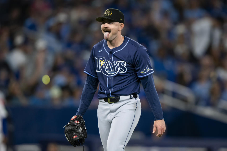 Tampa Bay Rays pitcher Tyler Alexander (14) reacts while walking back to the dugout after the seventh inning of the team's baseball game against the Toronto Blue Jays on Friday, May 17, 2024, in Toronto. (Christopher Katsarov/The Canadian Press via AP)