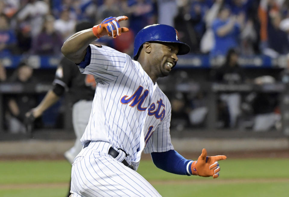 New York Mets' Austin Jackson celebrates after hitting a home run during the 13th inning against the Miami Marlins in a baseball game Saturday, Sept. 29, 2018, in New York. The Mets won 1-0. (AP Photo/Bill Kostroun)
