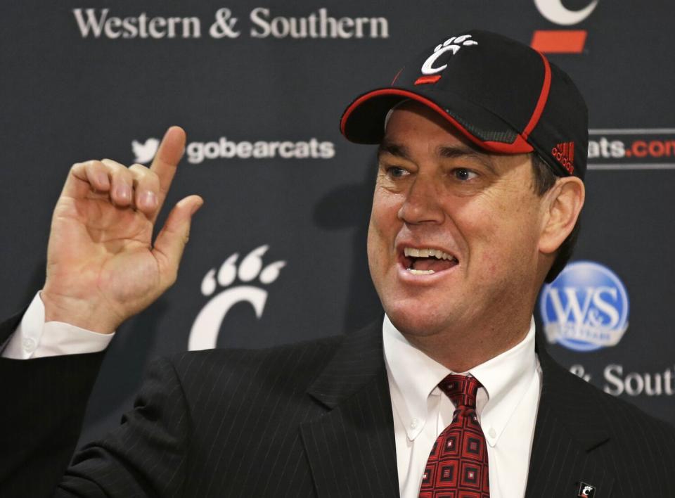 Mike Bohn speaks at a news conference after he was named Cincinnati athletic director on Feb. 6, 2014.