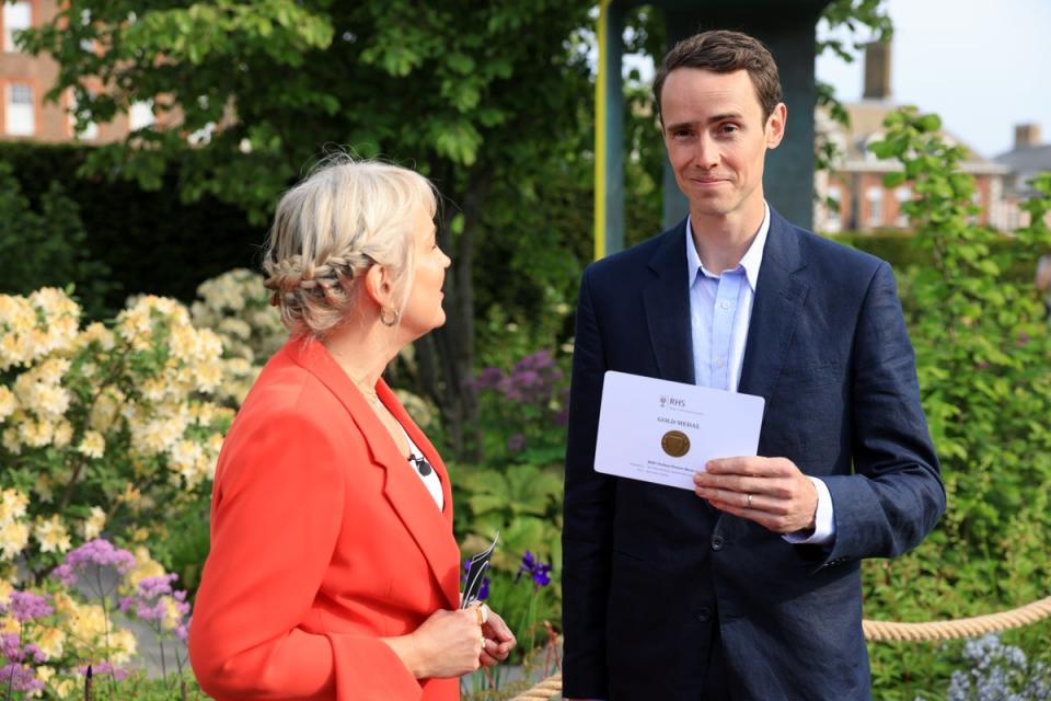 Charlie Hawkes receives gold medal from BBC presenter Nicki Chapman (Oliver Dixon)