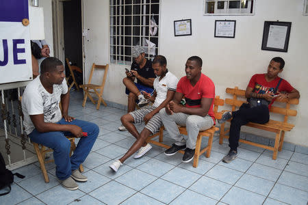 Cubans stranded in Mexico chat at a hotel after fellow nationals were deported in Tapachula, Mexico January 20, 2017. REUTERS/Jose Torres