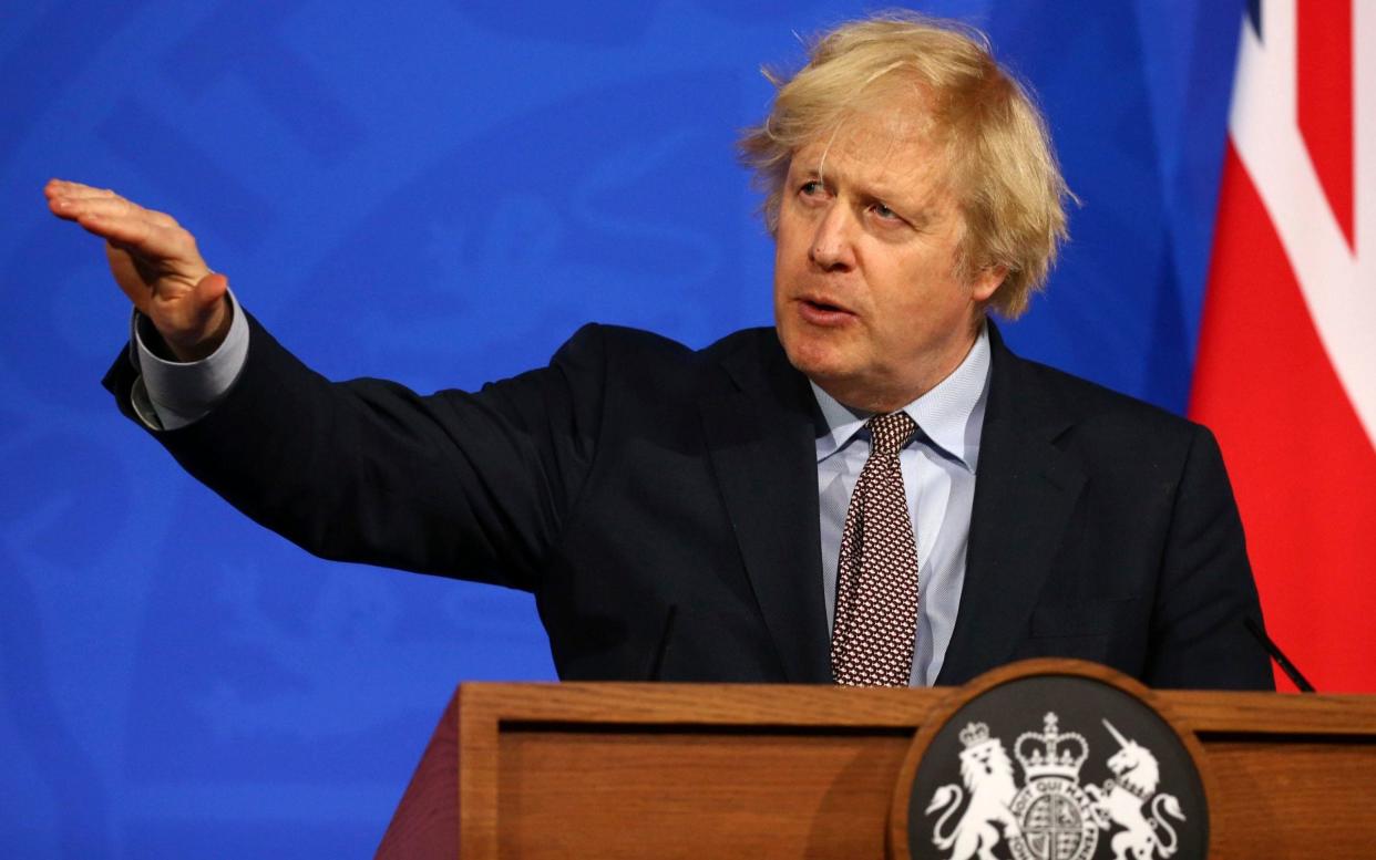 Boris Johnson is expected to signal that, when foreign travel is opened up, restrictions will be based on a traffic light system - Hollie Adams/AFP Pool