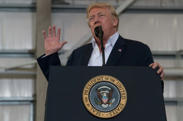 US President Donald Trump addresses a rally at the Orlando Melbourne International Airport in Florida, on February 18, 2017