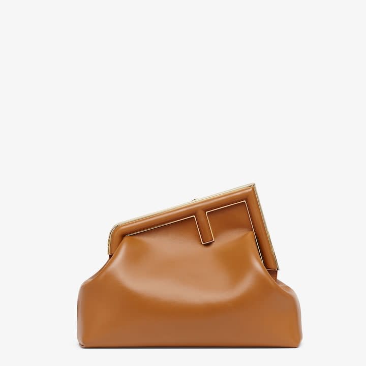 <p><a href="https://www.fendi.com/us-en/woman/bags/clutches-pouches/fendi-first-medium-brown-leather-bag-8bp127abvef0nyj" rel="nofollow noopener" target="_blank" data-ylk="slk:Shop Now;elm:context_link;itc:0;sec:content-canvas" class="link rapid-noclick-resp">Shop Now</a></p><p>Fendi First Medium</p><p>$3750.00</p><p>fendi.com</p>