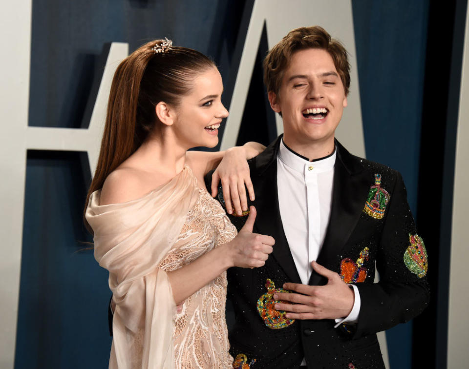 Dylan laughing and Barbara giving a thumbs up