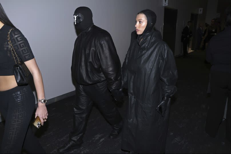 Kanye West, left and, Bianca Censori arrive during the NFL Super Bowl 58 football game Sunday, 11 February 2024, in Las Vegas.