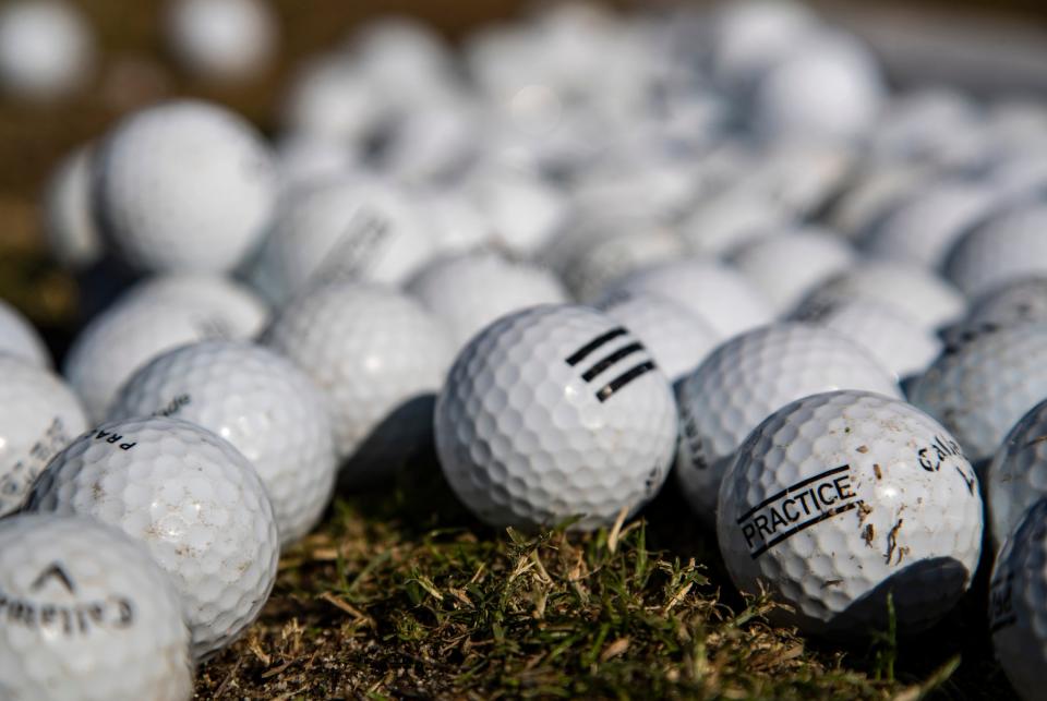 Golf balls are seen set out for use on the driving range at The Lights at Indio in a 2022 photo.