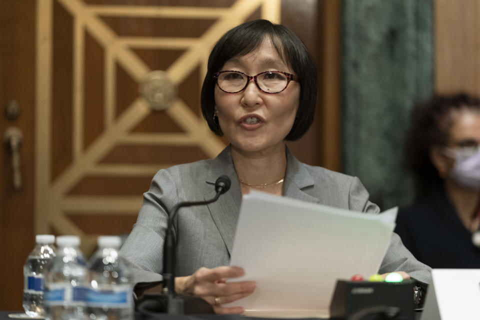 Saule Omarova of New York testifies before a Senate Banking, Housing, and Urban Affairs hearing on Capitol Hill in Washington to examine her nomination to be the Comptroller of the Currency, Thursday, Nov. 18, 2021. (AP Photo/Manuel Balce Ceneta)