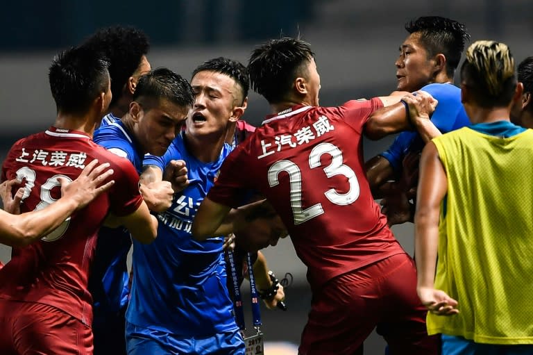 The brawl erupted after Shanghai SIPG playmaker Oscar appeared to fire the ball deliberately at Guangzhou players