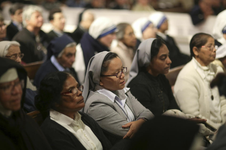 Faithful listen to Pope Francis during a meeting with Catholic priests and other Christian representatives in the cathedral of the capital, Rabat, Morocco, Sunday, March 31, 2019. Pope Francis is in Morocco for a two-day trip aimed at highlighting the North African nation's Christian-Muslim ties, while also showing solidarity with migrants at Europe's door and tending to a tiny Catholic flock. (AP Photo/Mosa'ab Elshamy)