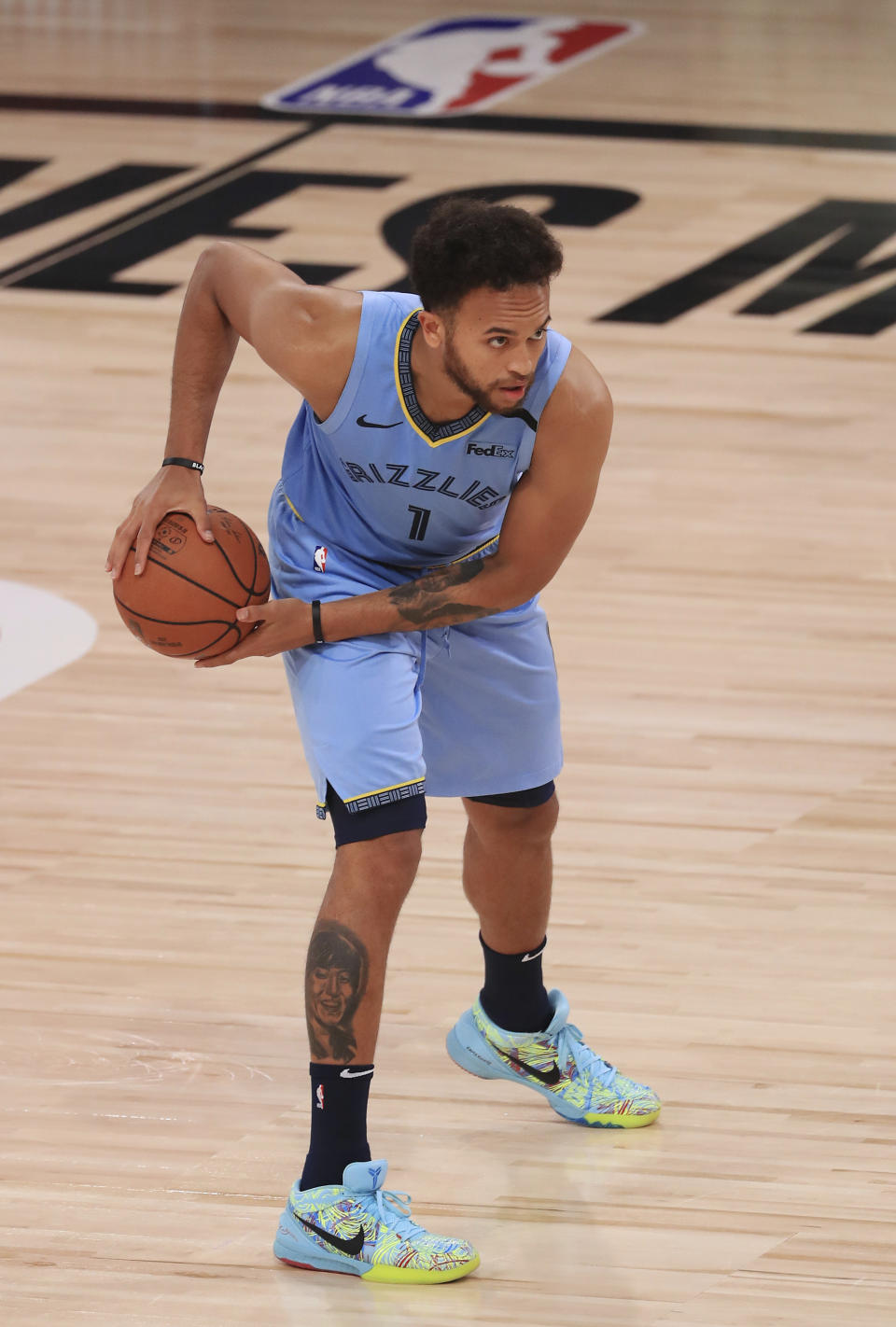 Memphis Grizzlies' Kyle Anderson handles the ball during the second half of an NBA basketball game against the Portland Trail Blazers, Friday, July 31, 2020, in Lake Buena Vista, Fla. (Mike Ehrmann/Pool Photo via AP)