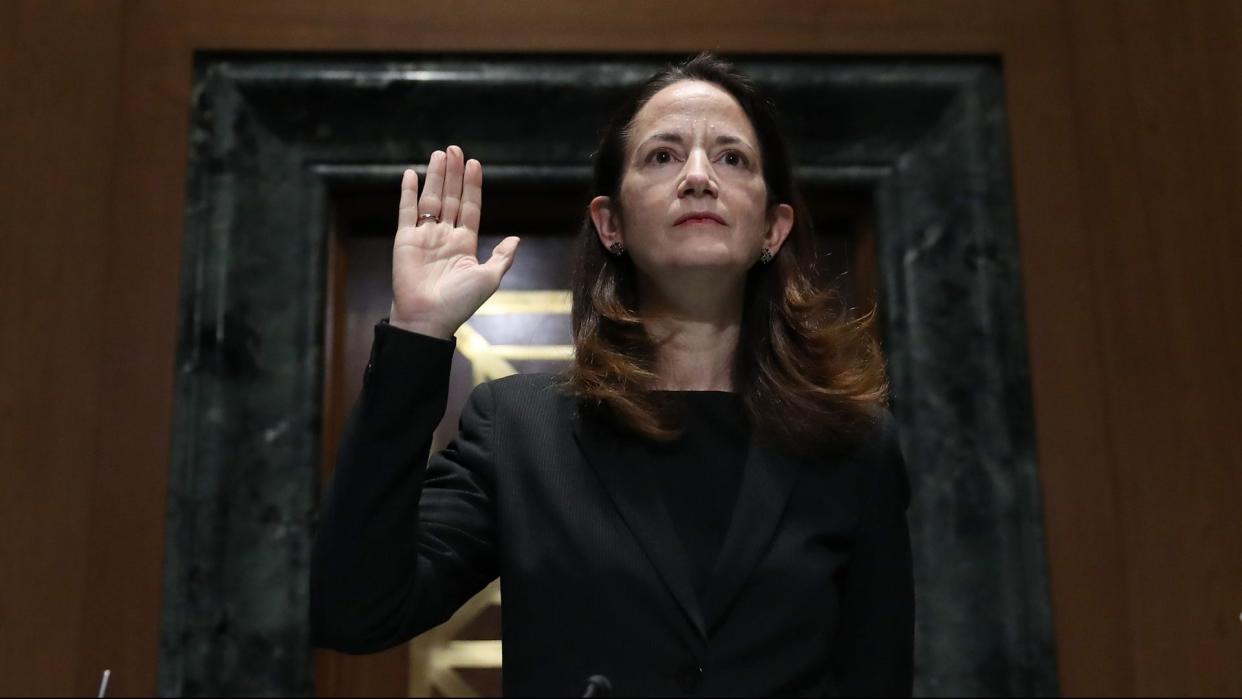 Mandatory Credit: Photo by Shutterstock (11716996n)WASHINGTON, DC - JANUARY 19: Avril Haines is sworn in at the start of her confirmation hearing before the Senate Intelligence Committee to be President-elect Joe Biden's national intelligence director in Washington, DC.