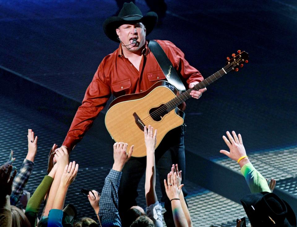 Garth Brooks performs for his fans at the packed Bridgestone Arena Dec. 16, 2010.