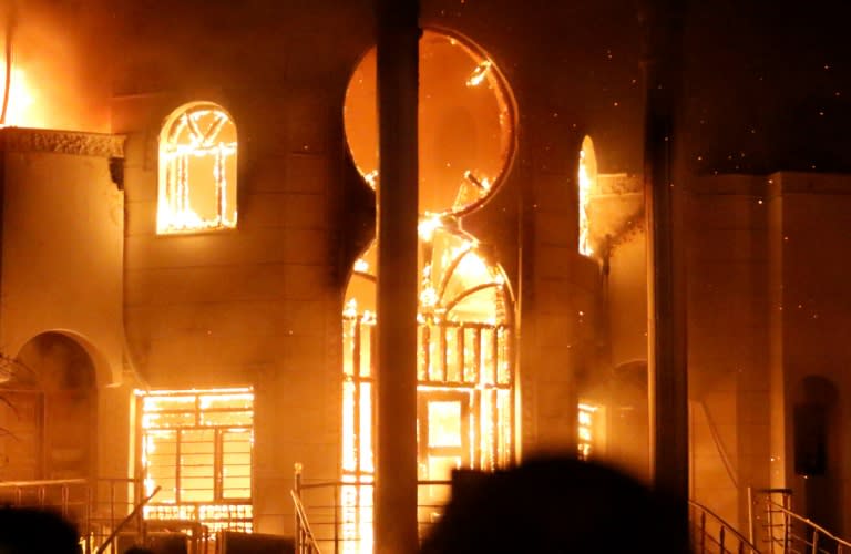 Fire rips through the Iranian consulate in Basra on September 7, 2018, during protests over a crisis in public services and alleged corruption among Iraqi officials