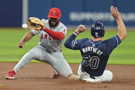Los Angeles Angels second baseman Luis Rengifo (2) prepares to tag out Tampa Bay Rays' Ben Rortvedt (30) attempting to steal second base during the third inning of a baseball game Tuesday, April 16, 2024, in St. Petersburg, Fla. (AP Photo/Chris O'Meara)