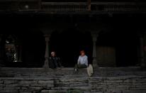 The Wider Image: Doctors scale rockslides, invoke gods to vaccinate Himalayan villages