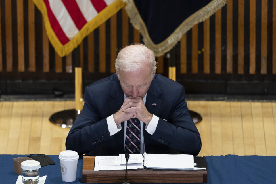 President Joe Biden looks at his notes during an event to discuss gun violence strategies, at police headquarters, Thursday, Feb. 3, 2022, in New York. (AP Photo/Alex Brandon)