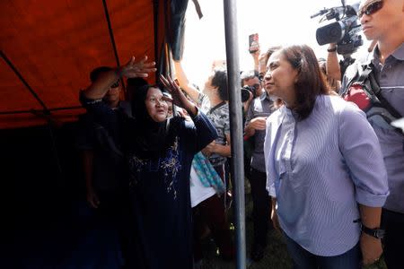 Philippines Vice-President Leni Robredo mets evacuated families at an evacuation center outside Marawi while government forces still fighting insurgents from the Maute group in Marawi, Philippines June 26, 2017. REUTERS/Jorge Silva