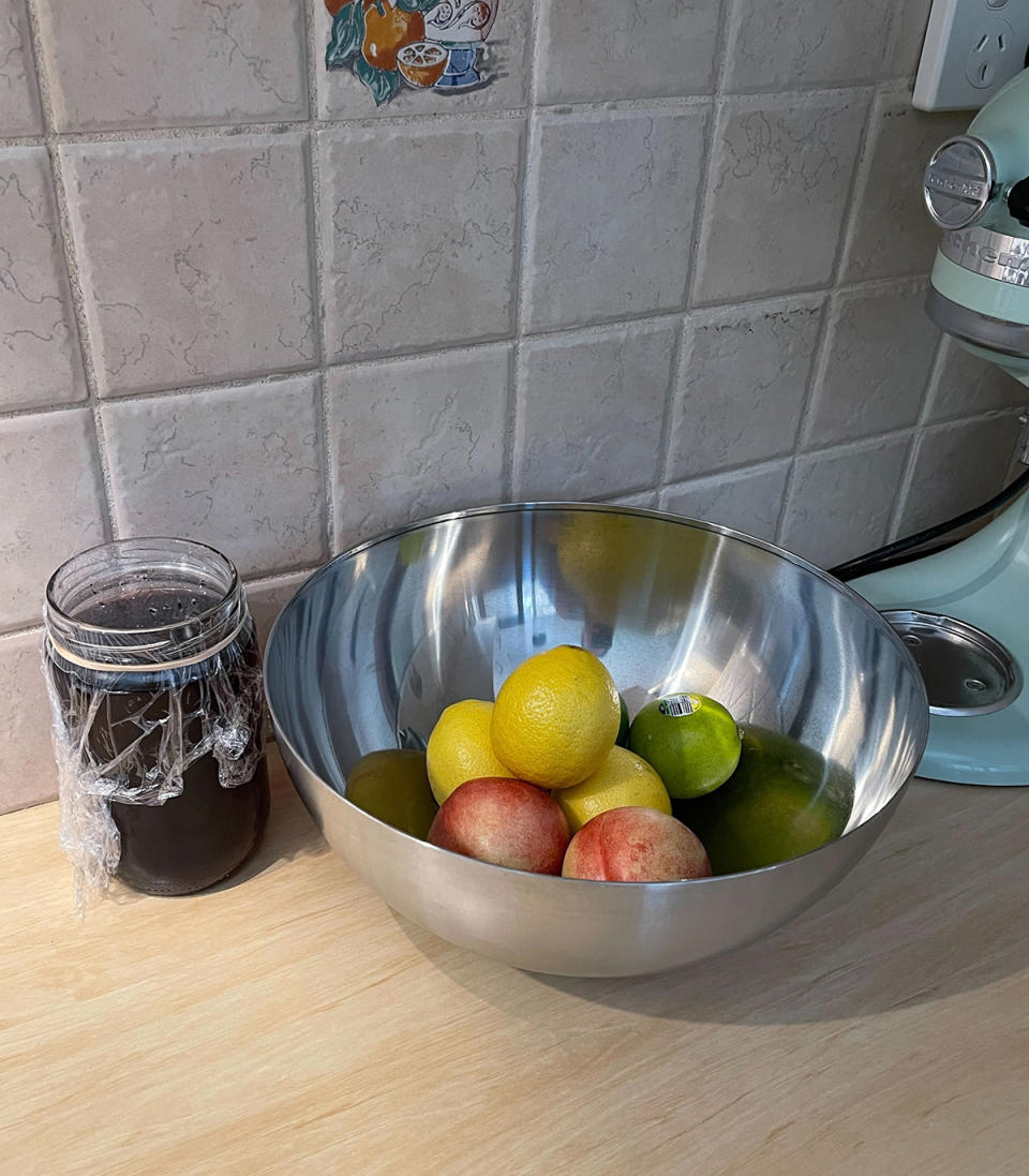 Fruit Fly mixture beside a fruit bowl