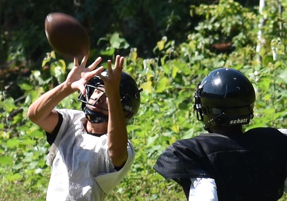 Diman football practice Wednesday at Talbot school.