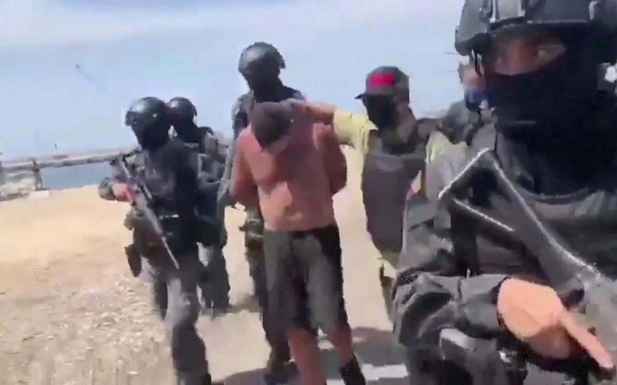 The regime claims that a video broadcast on Venezuelan state television shows American soldiers being arrested - REUTERS