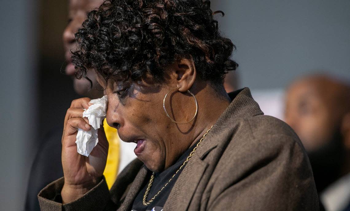 Sonya Williams, center, the mother of Darryl Williams, wipes away tears as attorney Ben Crump speak during a press briefing on the death of Darryl Williams on Thursday, February 16. 2023 at Mount Peace Baptist Church in Raleigh, N.C. Williams was tased by Raleigh police in January. Crump has been retained by the Williams family, calling for the officers involved to be charged with manslaughter.