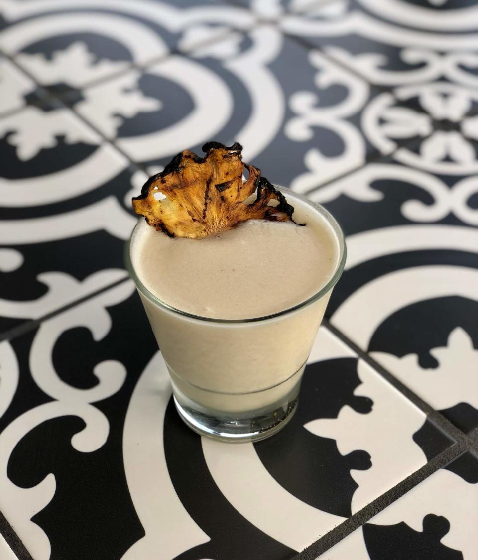 The Grilled Pineapple Pina Colada at Third Culture Kitchen in Titusville features home-grown pineapple and house-made coconut puree.