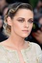 <p>To copy Kristen Stewart's smoky eye make-up from the Cannes Film Festival, blend a deep gold eyeshadow, like Chanel's <a rel="nofollow noopener" href="https://www.chanel.com/en_GB/fragrance-beauty/makeup/p/eyes/eyeshadows/illusion-d_ombre-long-wear-luminous-eyeshadow-p189810.html#skuid-0189950" target="_blank" data-ylk="slk:Illusion D'Ombre in Mirage;elm:context_link;itc:0;sec:content-canvas" class="link ">Illusion D'Ombre in Mirage</a>, £26, across your eyelids, brow bones and lower lash line. Then, use a darker eyeshadow, such as Mac's <a rel="nofollow noopener" href="https://www.maccosmetics.co.uk/product/13840/907/products/makeup/eyes/eyeshadow/eye-shadow-pro-palette-refill-pan?cm_mmc=GoogleBase-_-ShoppingFeed-_-Eyes-_-Eyeshadow&gclid=Cj0KCQjw3InYBRCLARIsAG6bfMQJlPaKp7upezfZyxtBglTl3s1VU8EQDP9_rVriXoHmsyjviCp8DZ0aAmR6EALw_wcB&gclsrc=aw.ds&dclid=CI-M-e_HltsCFQkx0wod_4AAzA#/shade/Soft_Brown" target="_blank" data-ylk="slk:Eye Shadow in Soft Brown;elm:context_link;itc:0;sec:content-canvas" class="link ">Eye Shadow in Soft Brown</a>, £10, to create the same cat-eye shape you normally would with liner. This will allow for a softer, more diffused finish, making your eyes look brighter but not heavy.</p>