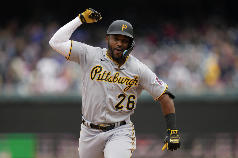Pittsburgh Pirates' Miguel Andujar gestures as he rounds the bases after hitting a two-run home run in the sixth inning of the first baseball game of a doubleheader against the Washington Nationals, Saturday, April 29, 2023, in Washington. (AP Photo/Patrick Semansky)
