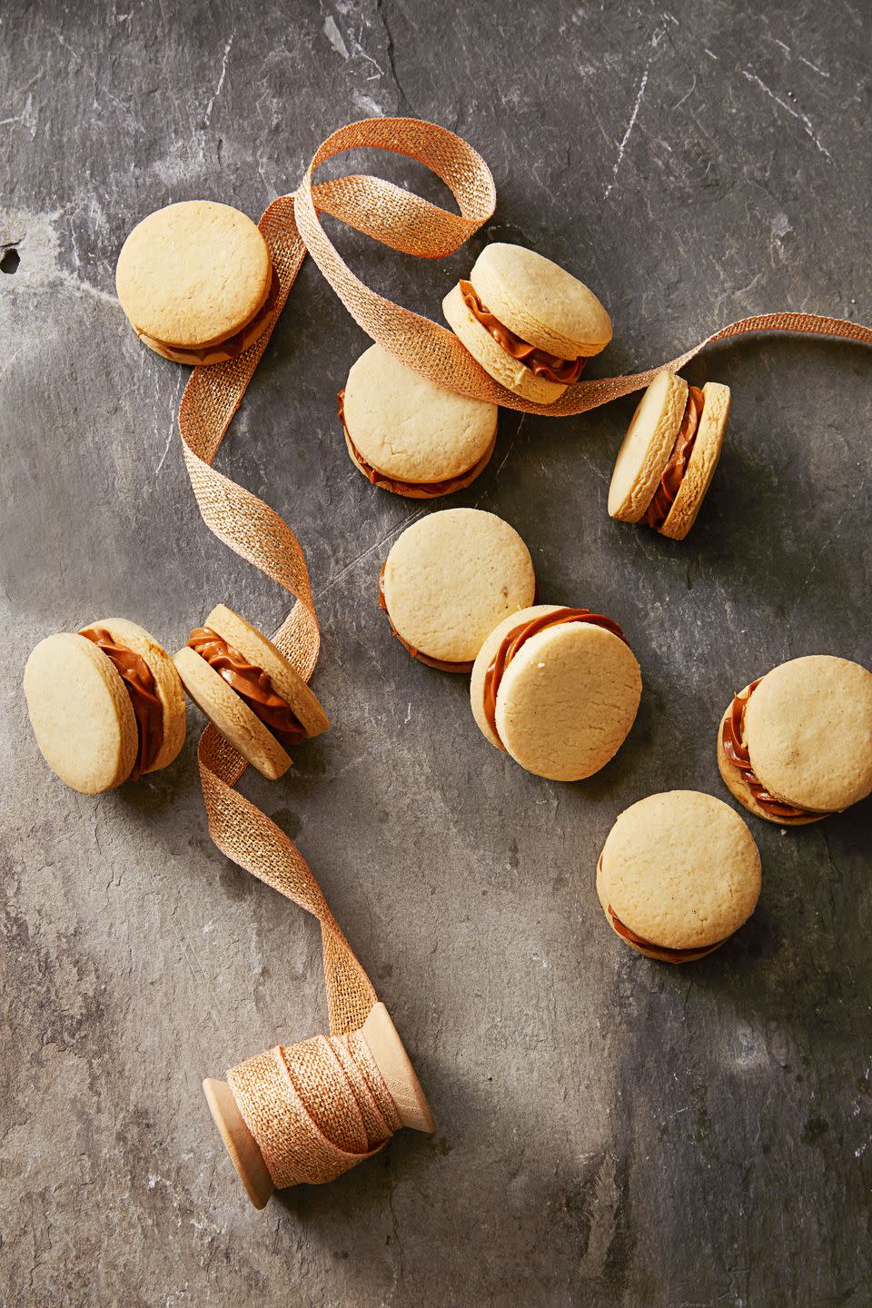 <p>Dulce de leche is like caramel made from sweetened milk, so it's pretty much perfect on its own. Sandwich it between two buttery cookies and presto! You won the cookie swap.</p><p><em><a href="https://www.goodhousekeeping.com/food-recipes/dessert/a35757/dulce-de-leche-sandwiches/" rel="nofollow noopener" target="_blank" data-ylk="slk:Get the recipe for Dulce de Leche Sandwiches »;elm:context_link;itc:0;sec:content-canvas" class="link ">Get the recipe for Dulce de Leche Sandwiches »</a></em></p>