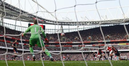 Football - Arsenal v Manchester United - Barclays Premier League - Emirates Stadium - 4/10/15 Alexis Sanchez scores the third goal for Arsenal Reuters / Dylan Martinez Livepic