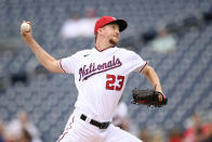 Washington Nationals starting pitcher Erick Fedde delivers a pitch during the first baseball game of a doubleheader against the San Francisco Giants, Saturday, June 12, 2021, in Washington. (AP Photo/Nick Wass)