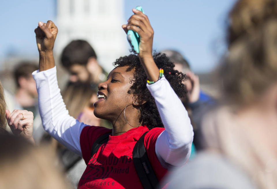 COLUMBIA, MO - NOVEMBER 9:  Protesters celebrate the resignation resignation of Missouri University president Timothy M. Wolfe on the Missouri University Campus November 9, 2015 in Columbia, Missouri. Wolfe resigned after pressure from students and student athletes over his perceived insensitivity to racism on the university campus.  (Photo by Brian Davidson/Getty Images)
