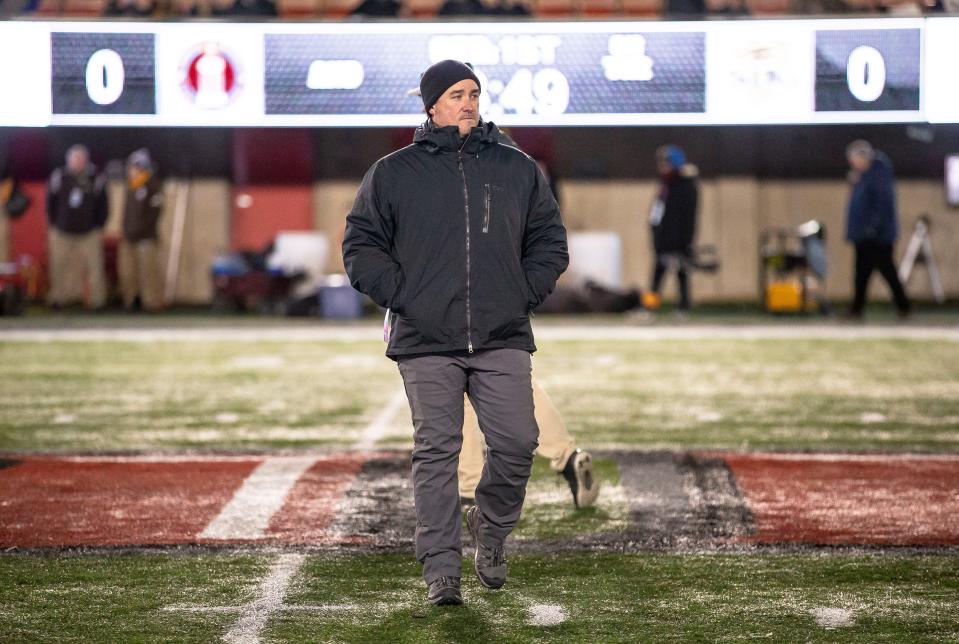 Assistant coach John Allison walks the field prior to the Cyclones taking on Joliet Catholic in the first half of the IHSA Class 4A Football State Championship at Huskie Stadium in Dekalb, Ill., Friday, November 26, 2021. [Justin L. Fowler/The State Journal-Register] 