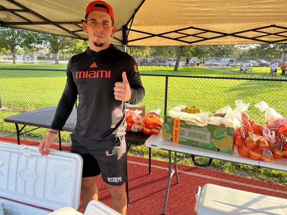 Miami Hurricanes receiver Xavier Restrepo gives the thumbs-up sign before the start of his youth football camp on Saturday, July 15, 2023 at Monarch High School in Coconut Creek.