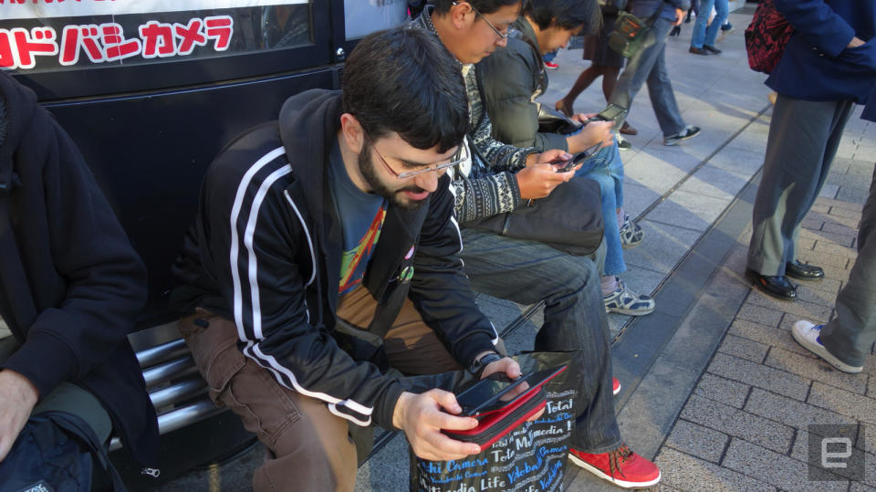 Ian Levenstein doing StreetPass outside Yodobashi Camera in Akihabara in Tokyo