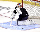 Florida Panthers goaltender Sergei Bobrovsky (72) makes a save during an NHL hockey training camp Thursday, Sept. 23, 2021, in Sunrise, Fla. (David Santiago/Miami Herald via AP)