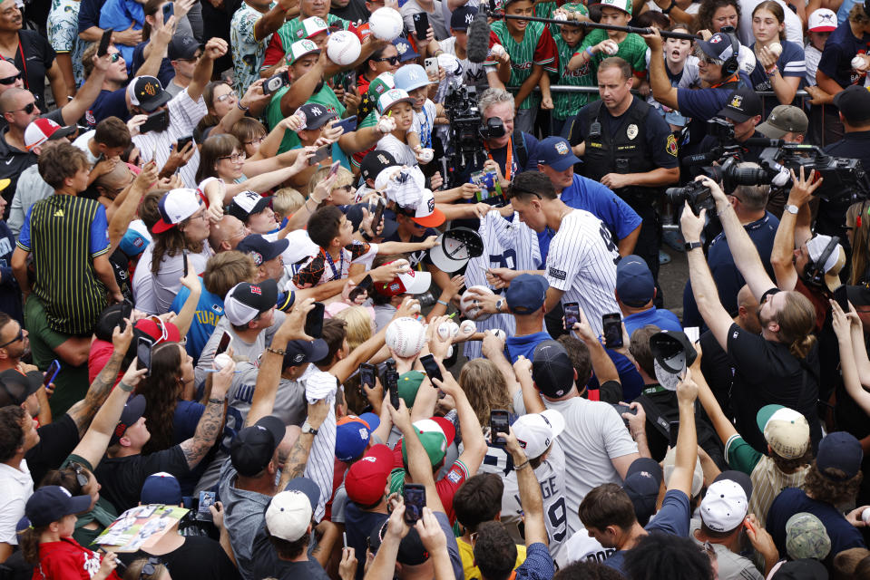 Aaron Judge signed autographs and posed for selfies with a crowd of Little League fans on Sunday. (Daniel Shirey/MLB Photos via Getty Images)