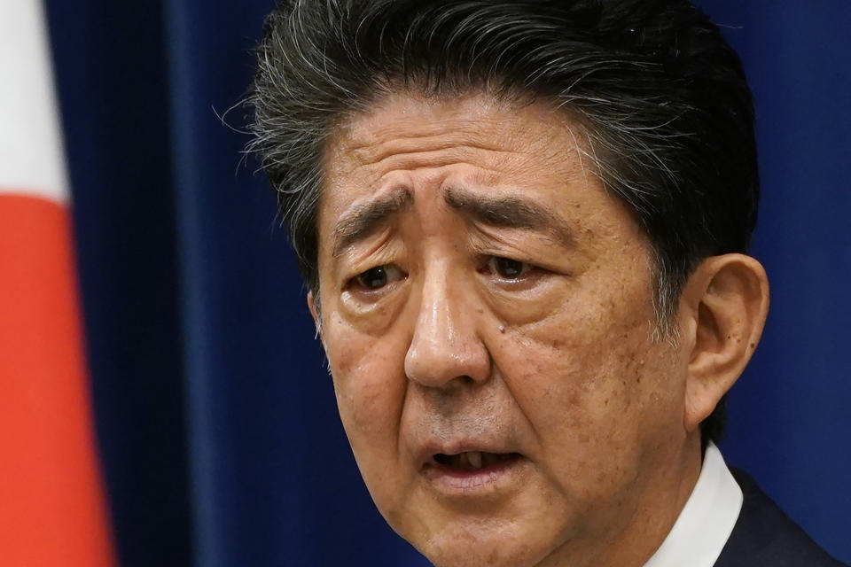 FILE - Japanese Prime Minister Shinzo Abe speaks during a press conference at the prime minister official residence in Tokyo on Aug. 28, 2020. On the day, Abe announced he will step down as prime minister, again citing health reasons, after his ulcerative colitis flares up again. By that point, Abe had already become Japan's longest-serving prime minister. (Franck Robichon/Pool Photo via AP, File)