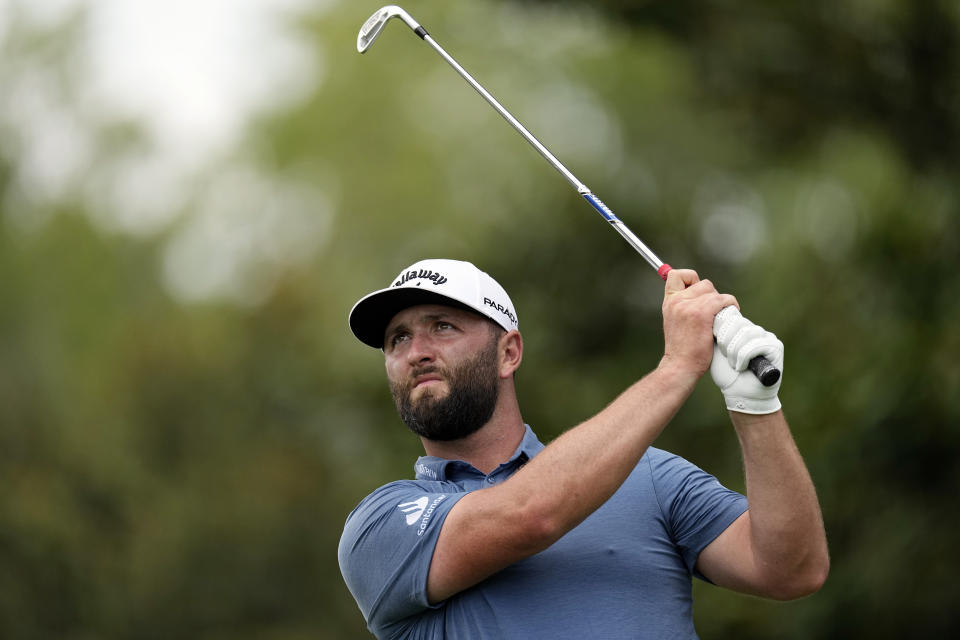 Jon Rahm hits from the eighth tee during the second round of the St. Jude Championship golf tournament Friday, Aug. 11, 2023, in Memphis, Tenn. (AP Photo/George Walker IV)
