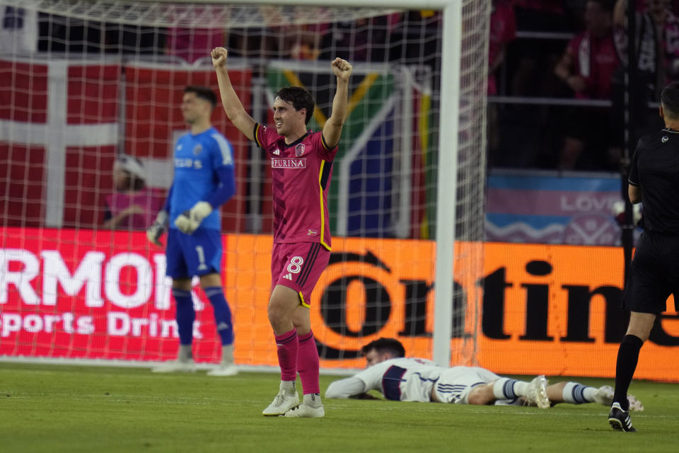 Vancouver Whitecaps' Alessandro Schopf (8) celebrates after an own goal by the Vancouver Whitecaps during the first half of an MLS soccer match Saturday, May 27, 2023, in St. Louis. (AP Photo/Jeff Roberson)